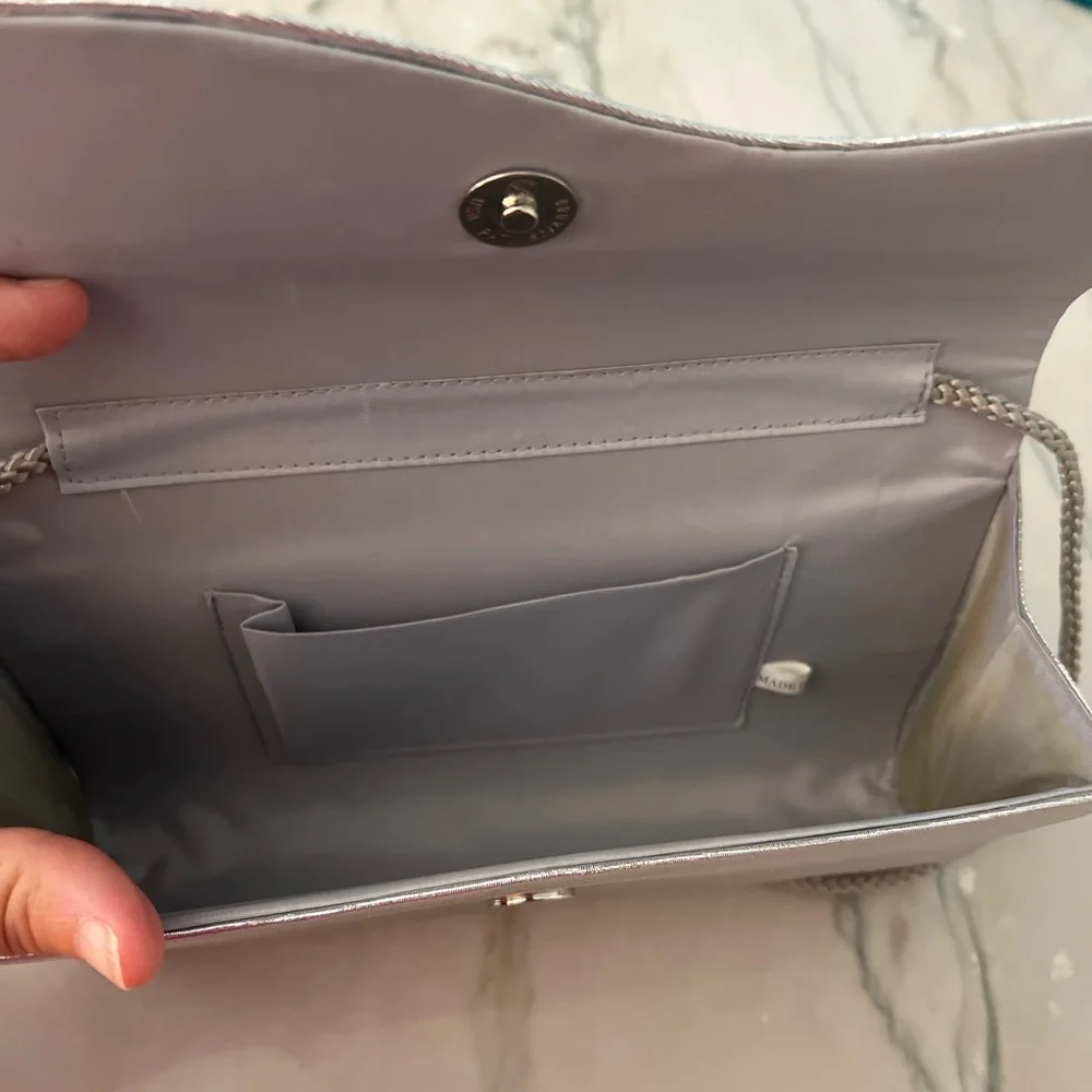 Fancy silver box purse with magnetic button closure one pocket inside